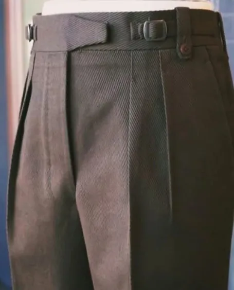 Pleats with buckle tabs