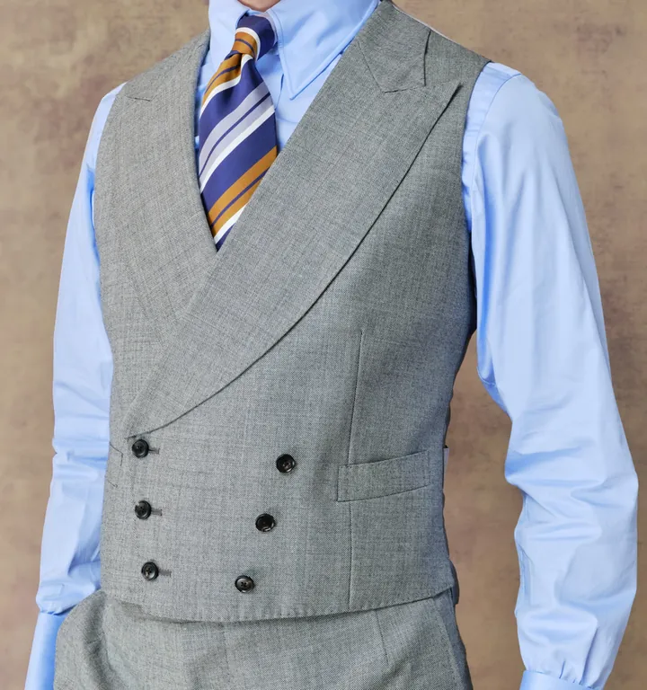 Double-breasted with peak lapels